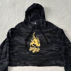 Vela Black Camo Cropped Hoodie with Yellow Campfire Graphic